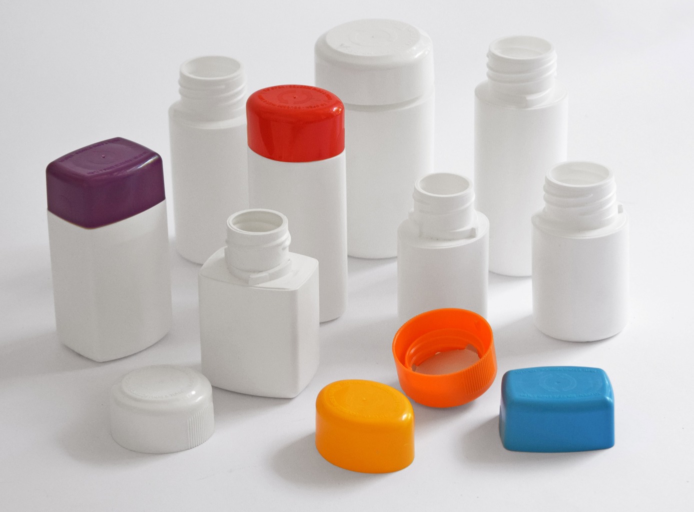 Childproof bottles and caps