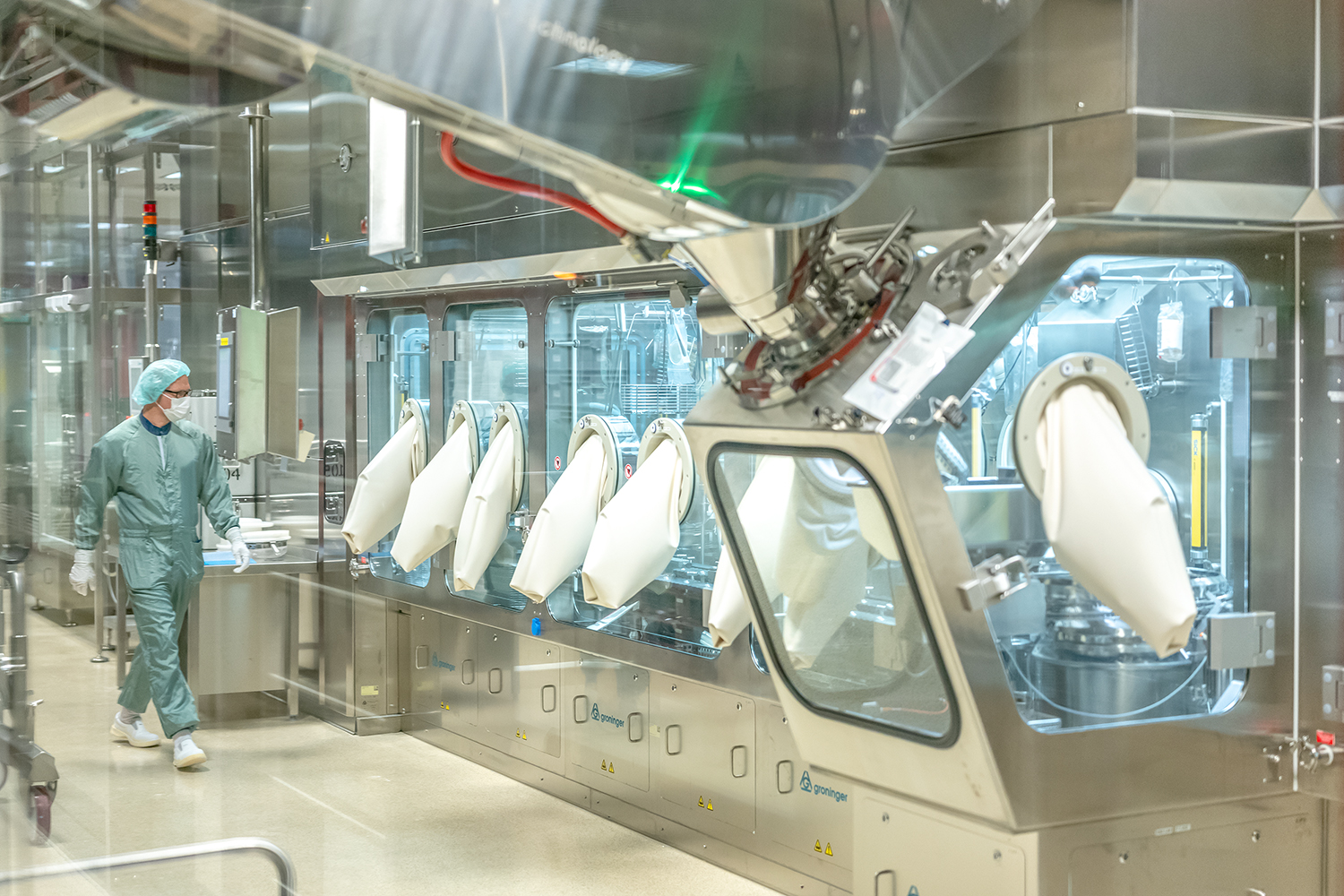 High-speed isolator line for fill finish of sterile injectables