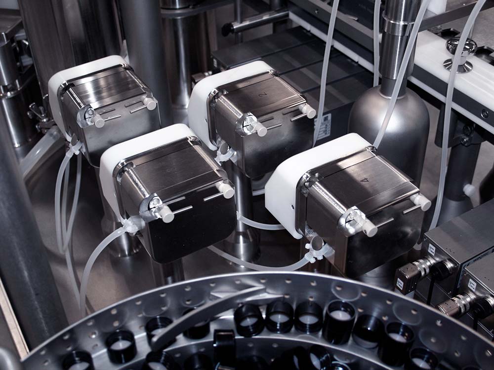 Automated Filling & Closing Machine for Vials, Bottles, etc. 2