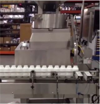 Canister Insertion Machine