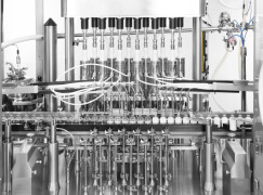 Vial filling machine with 12 pumps